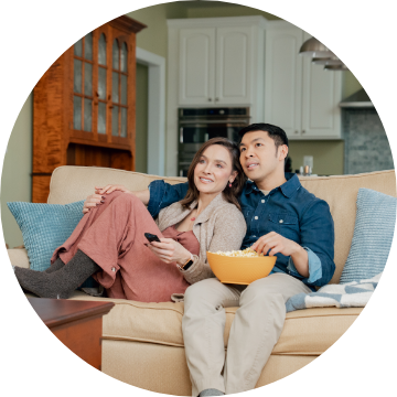 John Chu & Alena Vauter watching TV